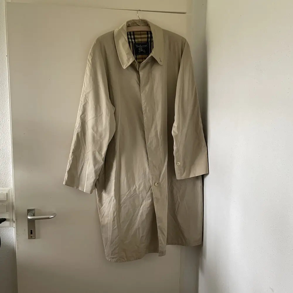 Burberry beige trench coat nova check lining.